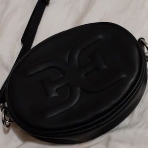 A black Sam Edelman small bag